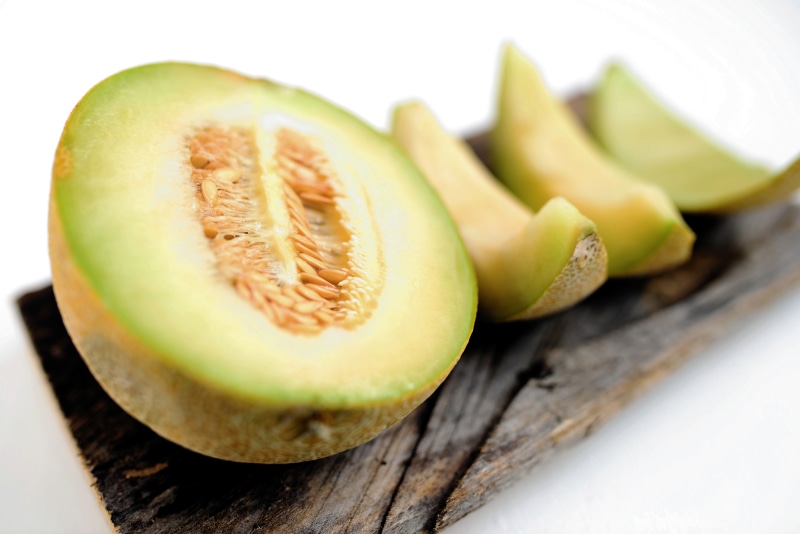 Sliced Cantaloupe Melon on Wood