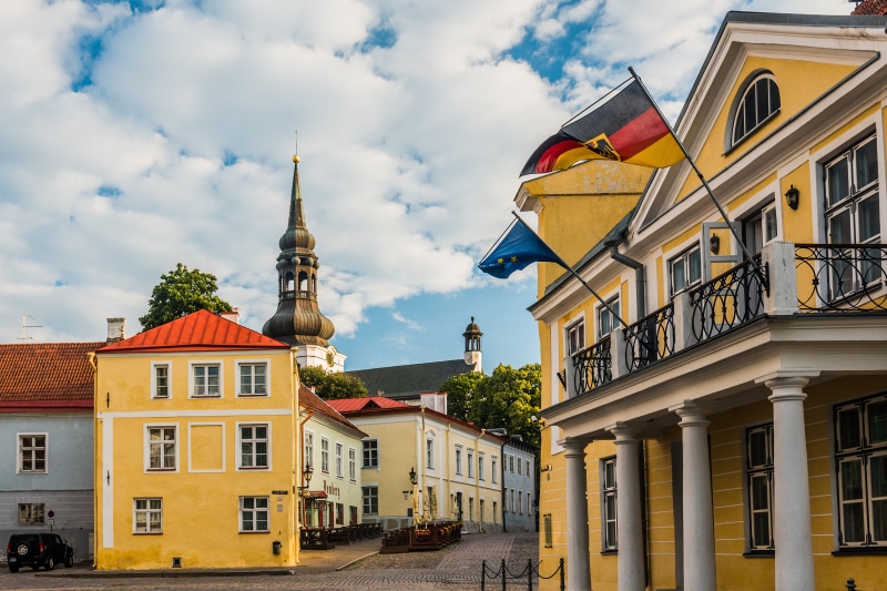 4K Tallinn Estonia Toomkirik Church and Houses with Flags