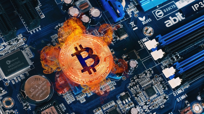 Bitcoin on a burning circuit board