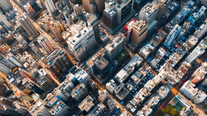 Aerial photography of a dense city with many buildings