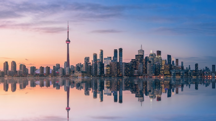 Toronto skyline with CN Tower at sunset, 4K