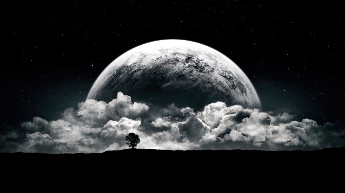 Moon over clouds with lone tree on hill 4K