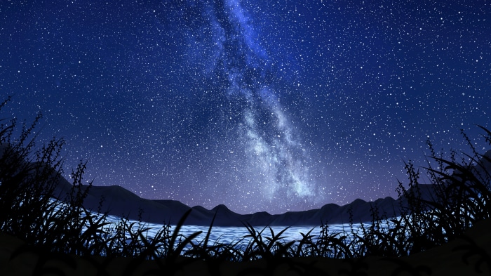 Starry Night Sky Over Mountains and Water