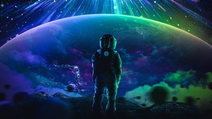 Astronaut looking at a colorful planet in space 4K
