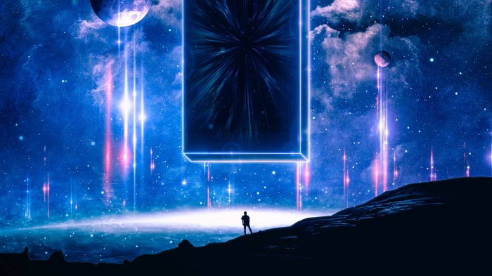 Man standing before a glowing portal in space with planets