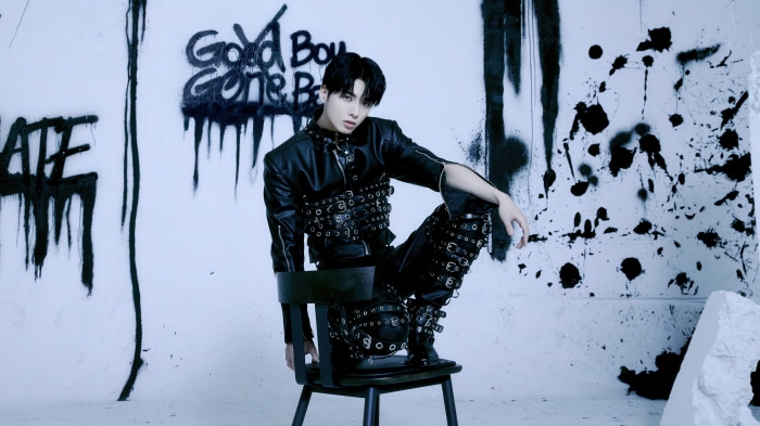 Taehyun from Tomorrow X Together in black outfit