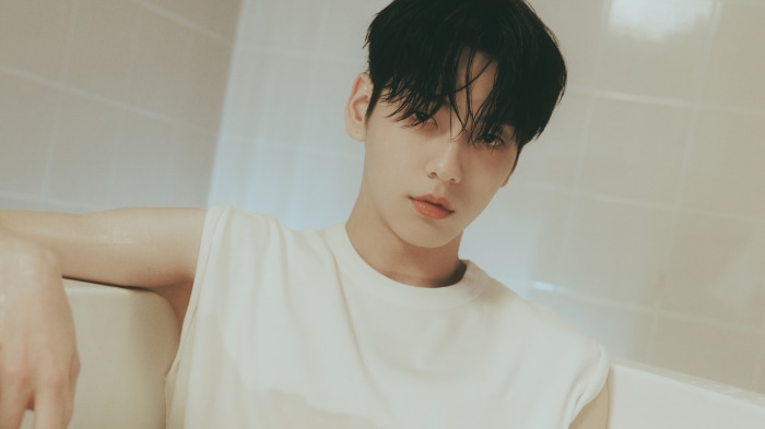 Soobin from Tomorrow X Together in a bathtub