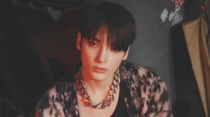 Hueningkai from TXT wearing a chunky necklace