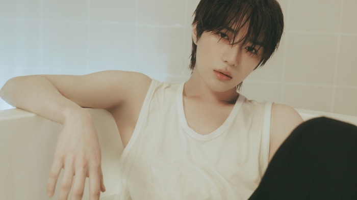 Beomgyu from TXT in a bathtub