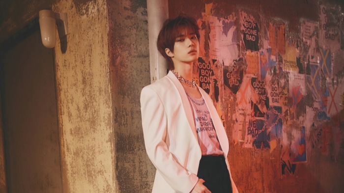 Beomgyu from Tomorrow X Together wearing a white blazer