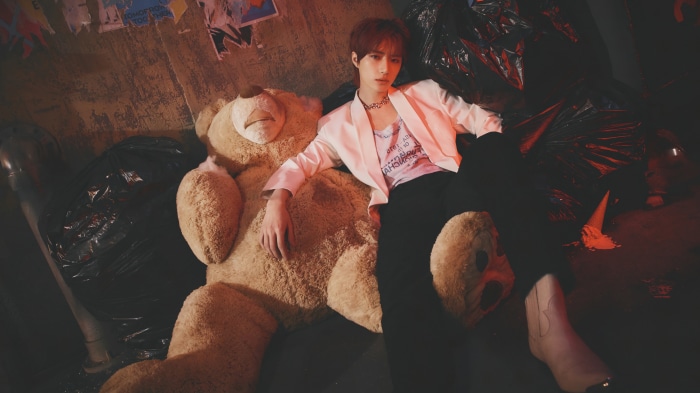 Beomgyu from Tomorrow X Together with a teddy bear