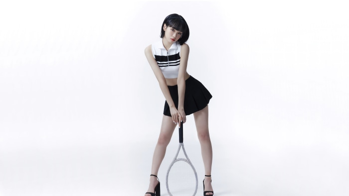 Kim Chaewon of LE SSERAFIM with tennis racket