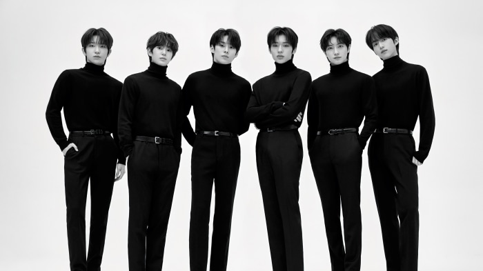 TNX group members in black turtlenecks