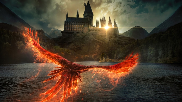 Phoenix flying over lake with Hogwarts castle