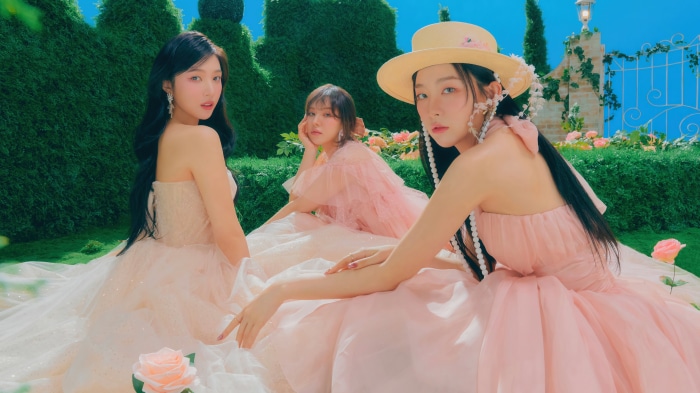 Red Velvet's Seulgi, Joy, and Wendy in pink dresses