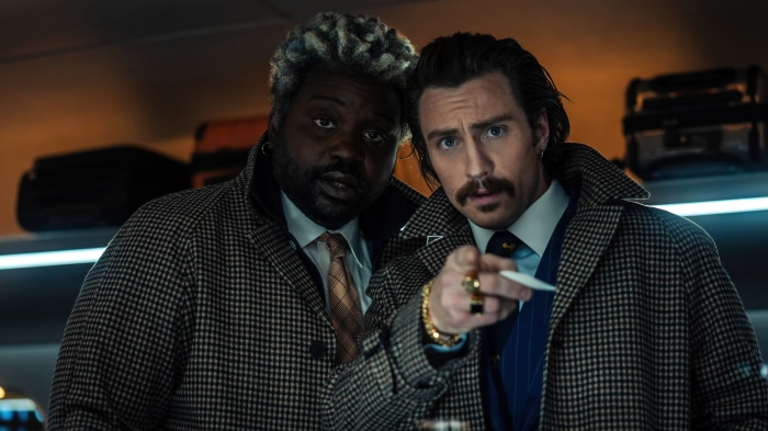 Aaron Taylor-Johnson and Brian Tyree Henry in Bullet Train 4K