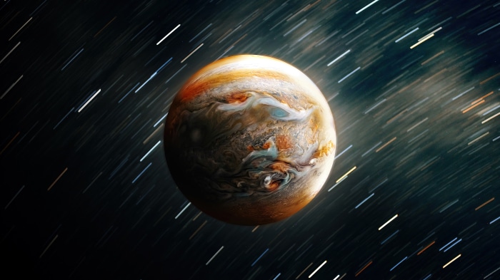 Jupiter in space with star trails 4K