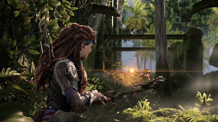Aloy from Horizon Forbidden West aiming a bow
