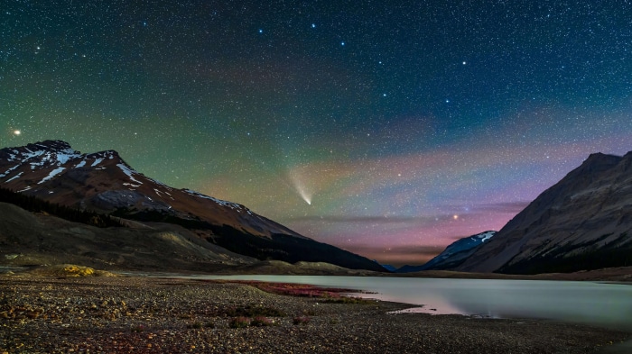 Comet over mountains and lake at night 4K