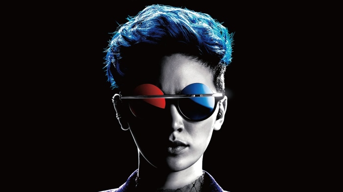 Person with blue hair and 3D glasses