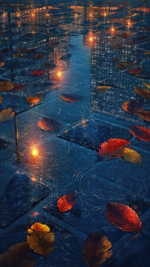 Autumn leaves on wet pavement with city reflections