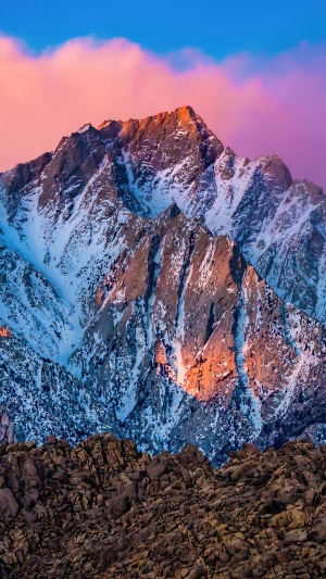 Snow-covered mountain peak at sunset in California