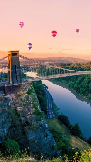 Clifton Suspension Bridge with Hot Air Balloons at Sunrise