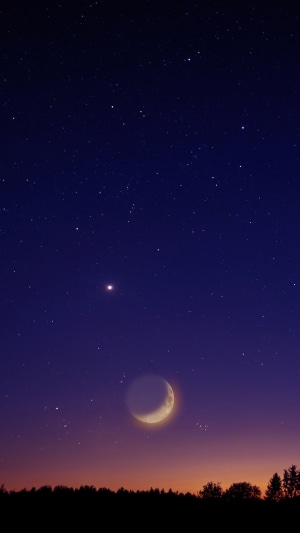Crescent Moon and Stars in the Night Sky