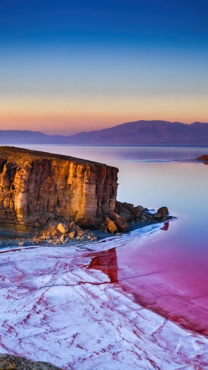 Pink Salt Lake and Cliffs at Sunrise in Iran