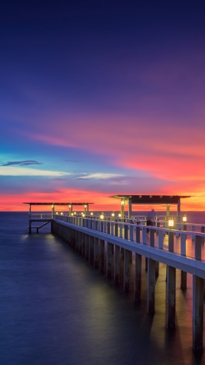 Pier at Sunset Over the Ocean
