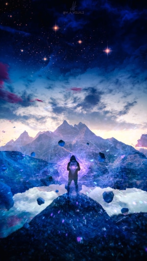 Person surrounded by glowing energy in a mountainous landscape