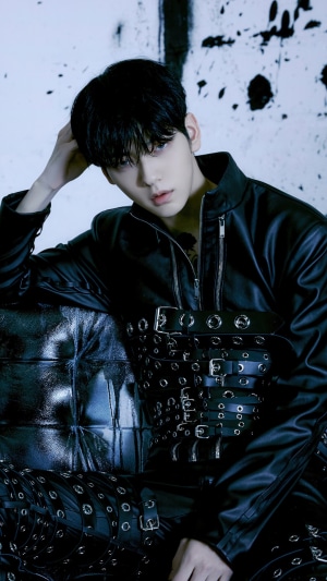 Soobin from TXT in black leather outfit