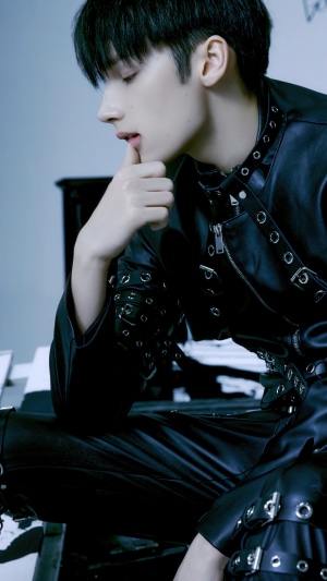 Huening Kai from TXT in black leather outfit