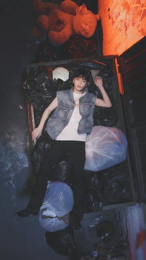 Soobin from TXT in a trash bin