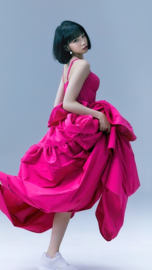 Kim Chaewon from LE SSERAFIM in a pink dress