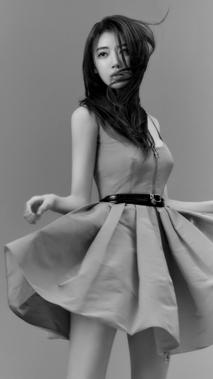 Sakura from LE SSERAFIM in a black and white photoshoot