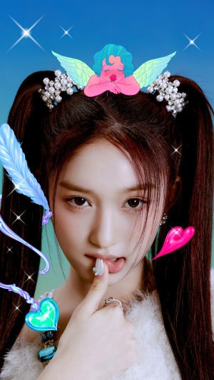 Leeseo from IVE with angel and heart decorations