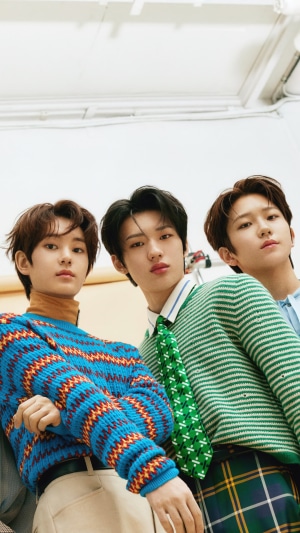 TNX members in colorful sweaters