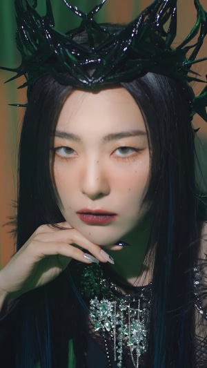 Seulgi from Red Velvet wearing a dark crown