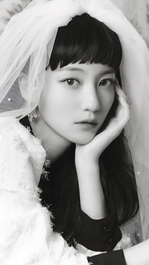 Bae Yu-bin from Oh My Girl wearing a veil