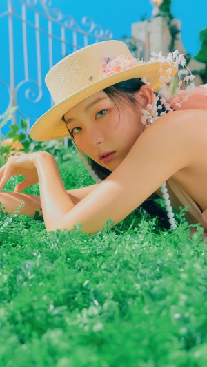 Seulgi from Red Velvet in a straw hat