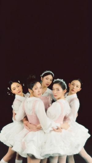 Red Velvet members in white and pink ballerina outfits