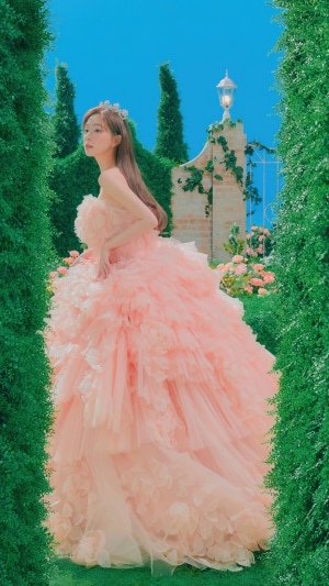 Irene from Red Velvet in a pink dress