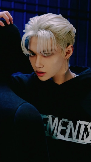 Felix from Stray Kids in Black Hoodie