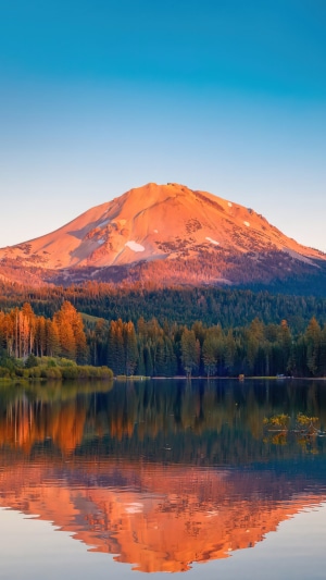 Mount Lassen reflected in a lake at sunrise