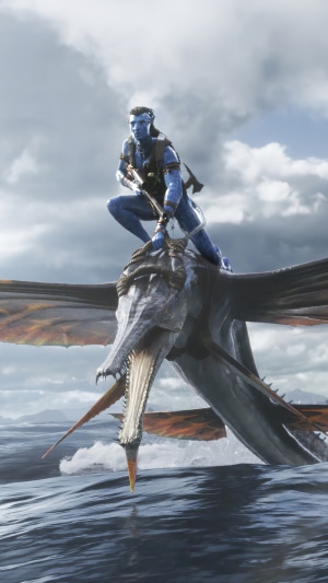 Jake Sully riding a flying creature in Avatar: The Way of Water