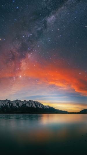Milky Way over Lake and Mountains at Sunset