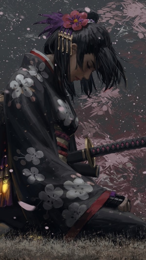 Samurai girl with katana in a snowy forest