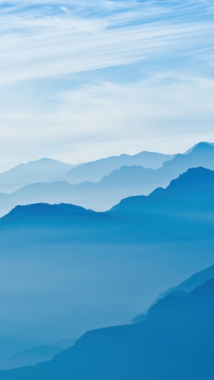 Blue Mountains and Sky with Wispy Clouds