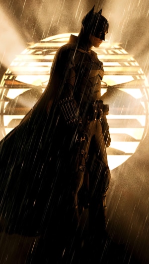 Batman from The Batman (2022) in front of Batsignal